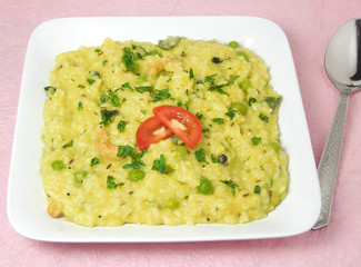 Indian food pongal, spicy variety. It is a vegetarian, traditional, popular and healthy dish made from rice and mung.