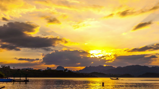Timelapse Heavenly Sunset. Cheow Lan Lake or Rajjaprabha Dam Reservoir, Thailand