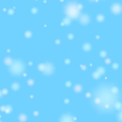 Snow fall. Blurred falling snow on the blue background 