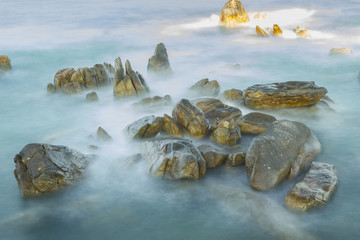 Floating reef at sea due to the long exposure makes smooth sea surface like flying underwater clouds makes the reef like floating on clouds is beautiful