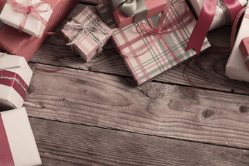 Christmas presents on old wooden table