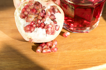 pomegranate juice with fresh fruit on the table