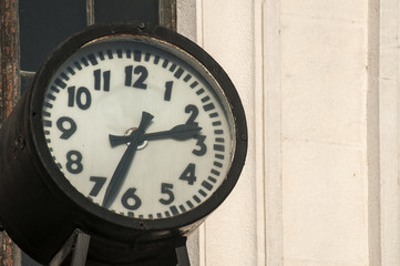 Old vintage obsolete public clock of railway station