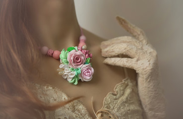 Romantic style: Fashion studio shot of beautiful woman with a fl