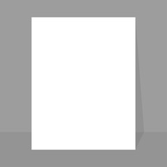 Sheet of paper stale on the wall with shadow