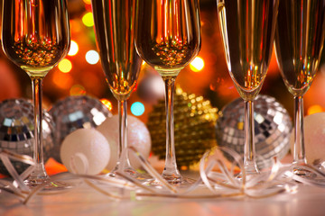Glasses of champagne and christmas balls