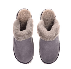 a pair of gray suede winter slipper on isolated on white background