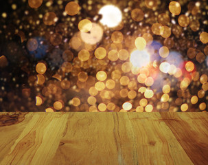 Perspective wood board with festive abstract lights defocused ba