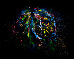 explosion acrylic colours black background. creativity, uniqueness, artistic