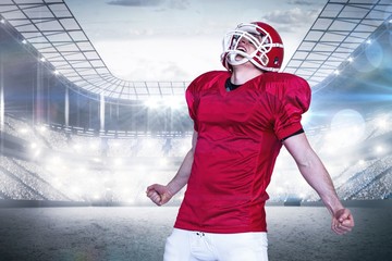 Composite image of a triumph of an american football player 