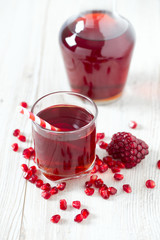 pomegranate juice on table