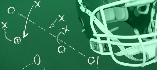 Composite image of an american football helmet on the field