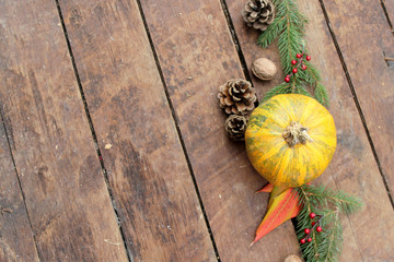 Pumpkin on wooden background - Halloween, Christmas and Thanksgiving concept - decoration and copy space