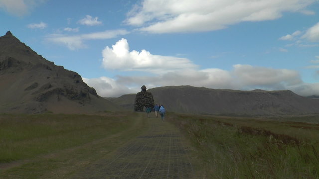 landscape at snaefellsjoekkull in iceland with monument to the local saga hero bardur snaefellsass