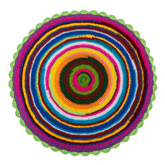 Colorful knitted crochet acrylic mat on a white background