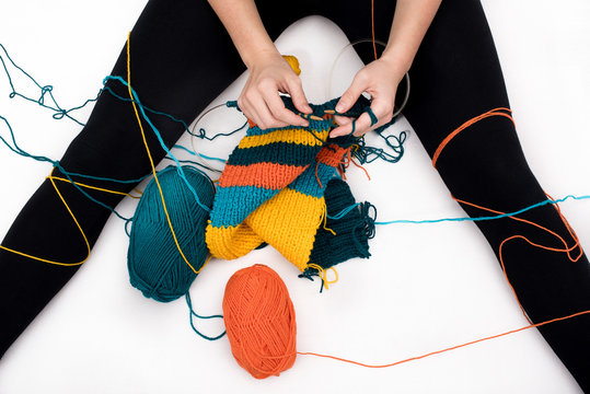  Knitting. Young Woman Knitting On White Background.