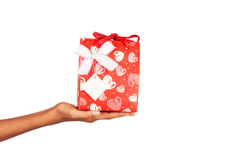 hand girl hold red gift box christmas background