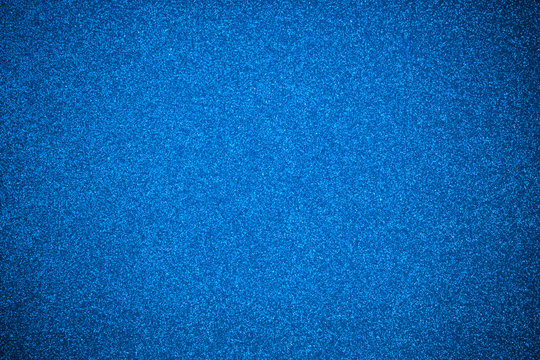 close up blue glitter paper texture background