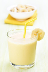 Milkshake with banana in glass