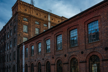 Fototapeta na wymiar Facade of an old textile factory, Lodz, Poland