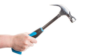 Female hand holding a hammer