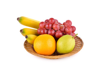 mixed fruit, banana, orange, pear, grape in basket on white back