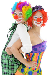Fototapeta na wymiar Clowns in Kostüm zu Karneval, Fasching oder Fastnacht haben Spaß und Freude
