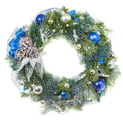 Fototapeta na wymiar Christmas wreaths with decorations cones and balls (shallow DOF), isolated on white background