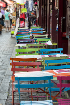 Paris - Very colorful Parisian outdoor cafe in Montmartre