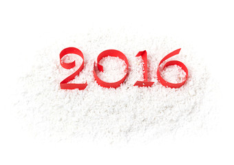2016 figures from red paper ribbon in the snow. Isolated on whit