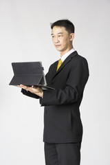 Young businessman use of notebook computer