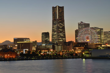 Yokohama, Japan skyline with mount Fuji at dusk