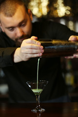 Bartender making cocktail