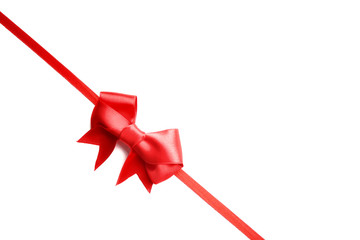 Shiny red ribbon with bow isolated on white