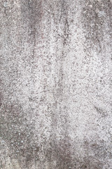 Worn grey cement stone wall