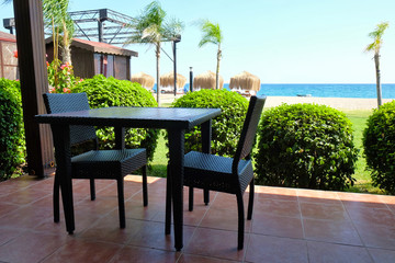 Empty seats and tables in  dining room of hotel