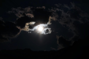 Naklejka premium Blue sky with clouds and mountains peak
