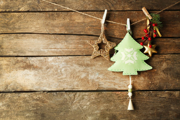 Beautiful Christmas toys on old wooden background