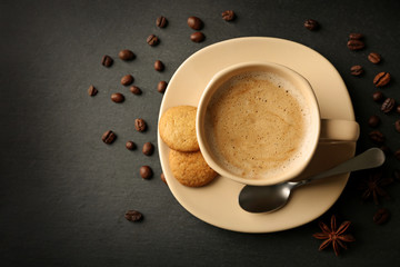 Cup of coffee on gray background