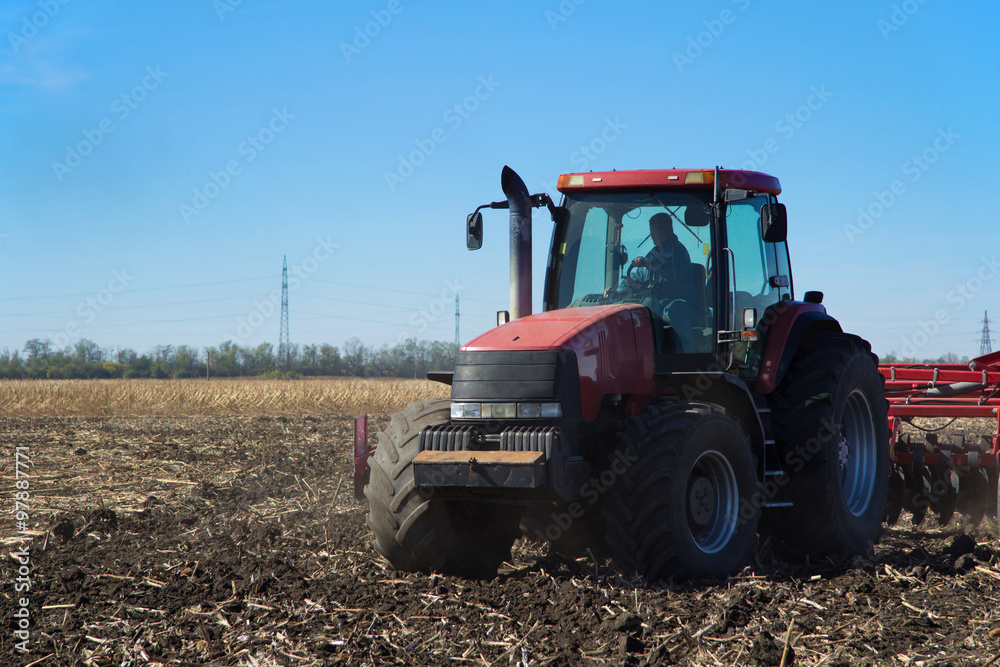 Aufkleber red tractor working in the field