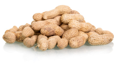 Handful of raw peanuts close-up isolated on white