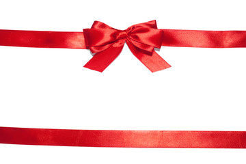 Red ribbon with bow on white