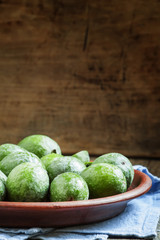 Feijoa on a plate, selective focus