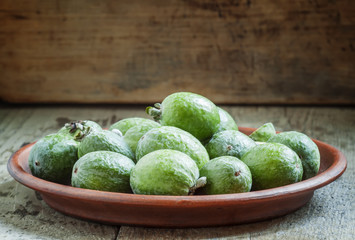 Feijoa on a plate, selective focus
