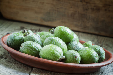 Feijoa on a plate, selective focus