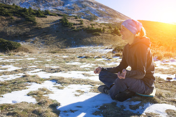 The girl is engaged in nature.