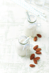 Organic almond milk in glass bottles