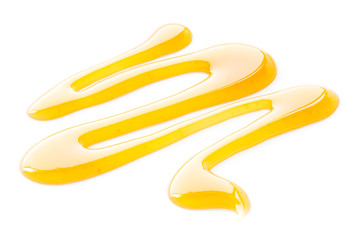 Honey drop isolated on white background