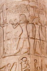 Egyptian hieroglyphs. Hieroglyphic carvings on a wall