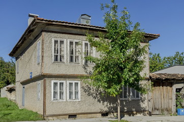 Razgrad town, street and house. Old house with windows, Bulgaria